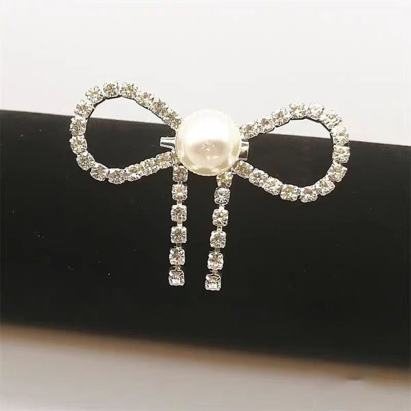 Diamond Studded Bow Brooch accessory for women's suits, coats, headwear, and even bags or shoes.